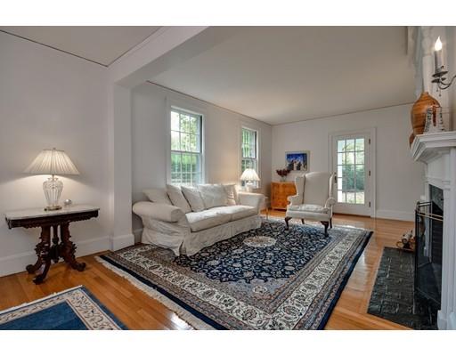 642 Worcester Street Wellesley, MA 02482 - Photo 7 of 23 a living room with furniture and a rug