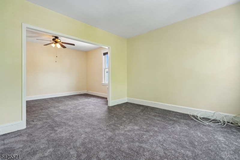 7 Beekman Street, Unit 2 Bloomfield, NJ 07003 - Photo 13 of 27 an empty room with a window