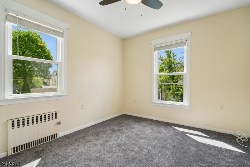 7 Beekman Street, Unit 2 Bloomfield, NJ 07003 - Photo 16 of 27 an empty room with a window