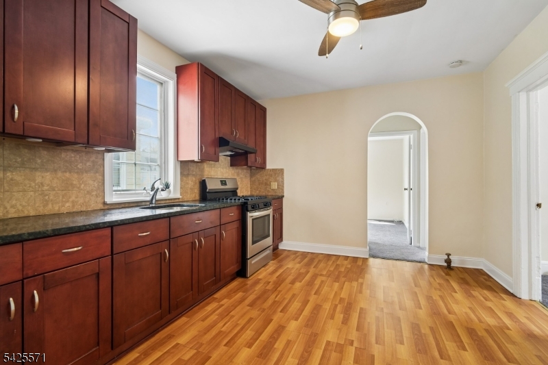 7 Beekman Street, Unit 2 Bloomfield, NJ 07003 - Photo 19 of 27 a view of a kitchen with a sink and cabinets