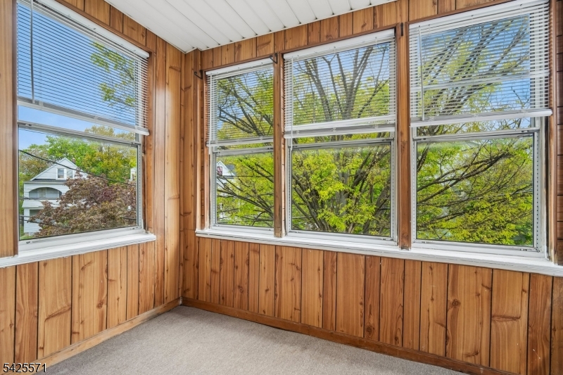 7 Beekman Street, Unit 2 Bloomfield, NJ 07003 - Photo 2 of 27 a view of a room that has a large window