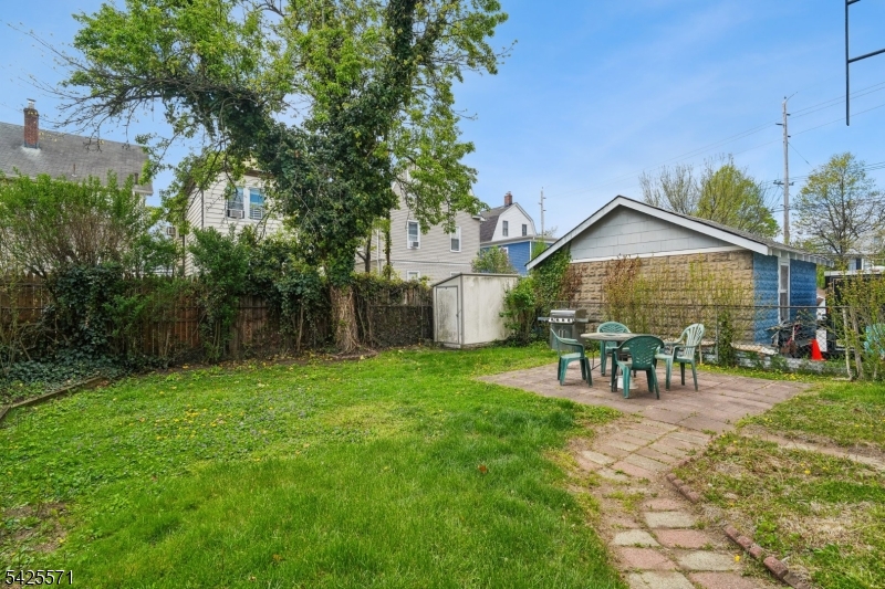 7 Beekman Street, Unit 2 Bloomfield, NJ 07003 - Photo 26 of 27 a view of a house with a yard and sitting area