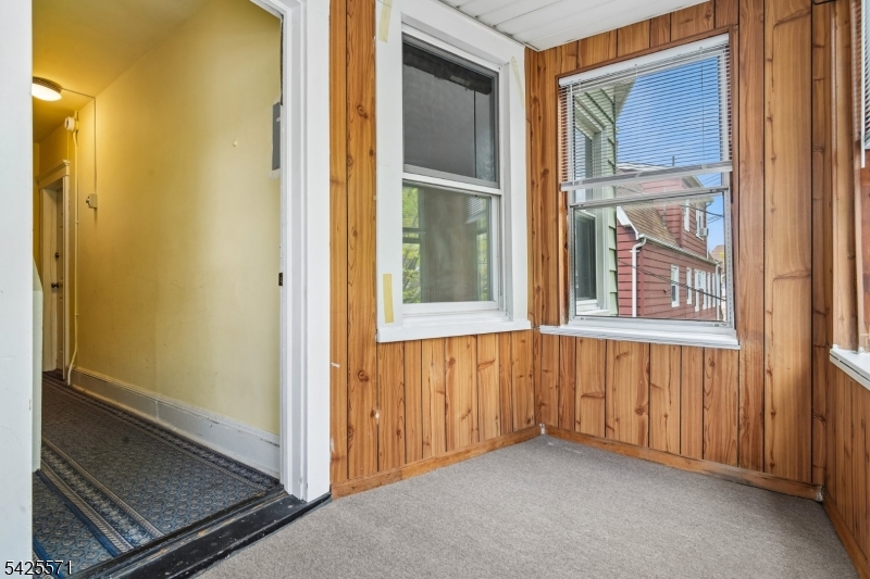7 Beekman Street, Unit 2 Bloomfield, NJ 07003 - Photo 4 of 27 a view of an empty room with a window