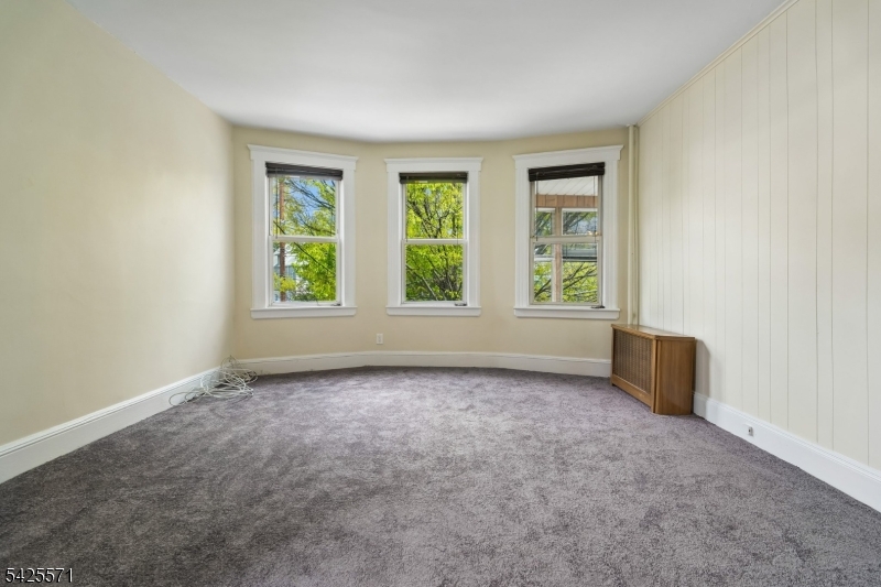 7 Beekman Street, Unit 2 Bloomfield, NJ 07003 - Photo 10 of 27 an empty room with windows