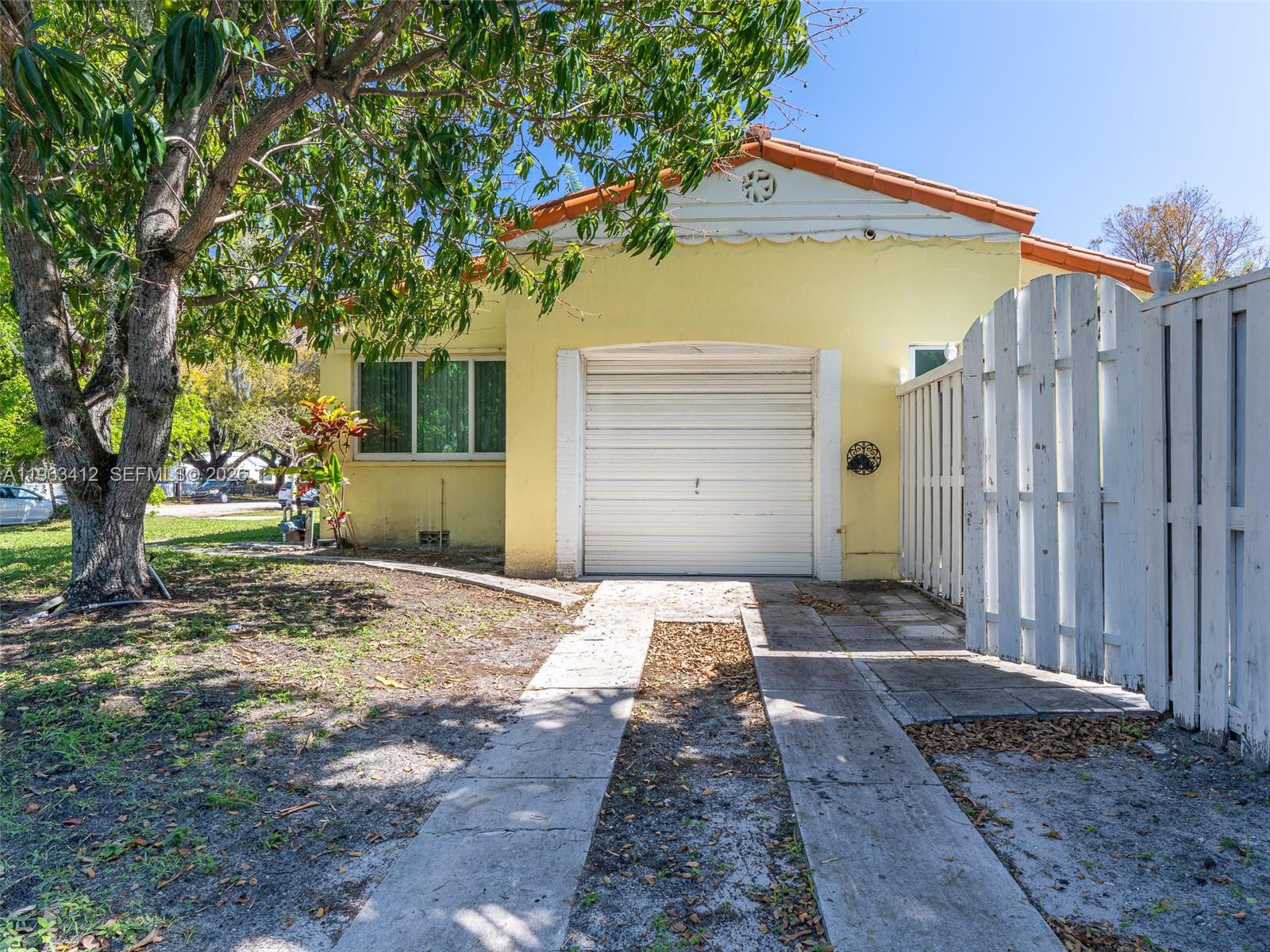 630 Southwest 25th Road Miami, FL 33129 - Photo 32 of 35 a view of a backyard of the house