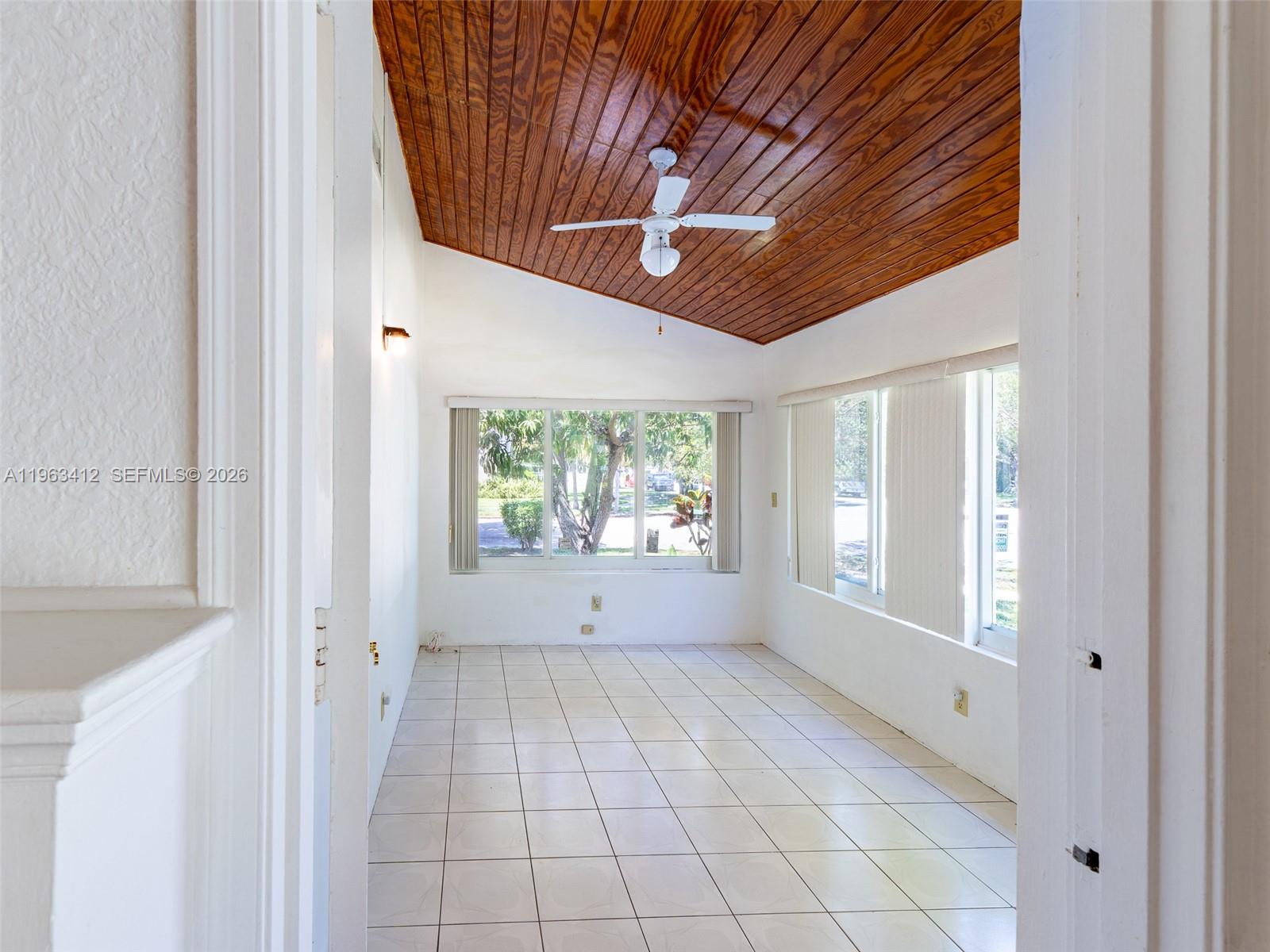 630 Southwest 25th Road Miami, FL 33129 - Photo 8 of 35 a view of an empty room with a window