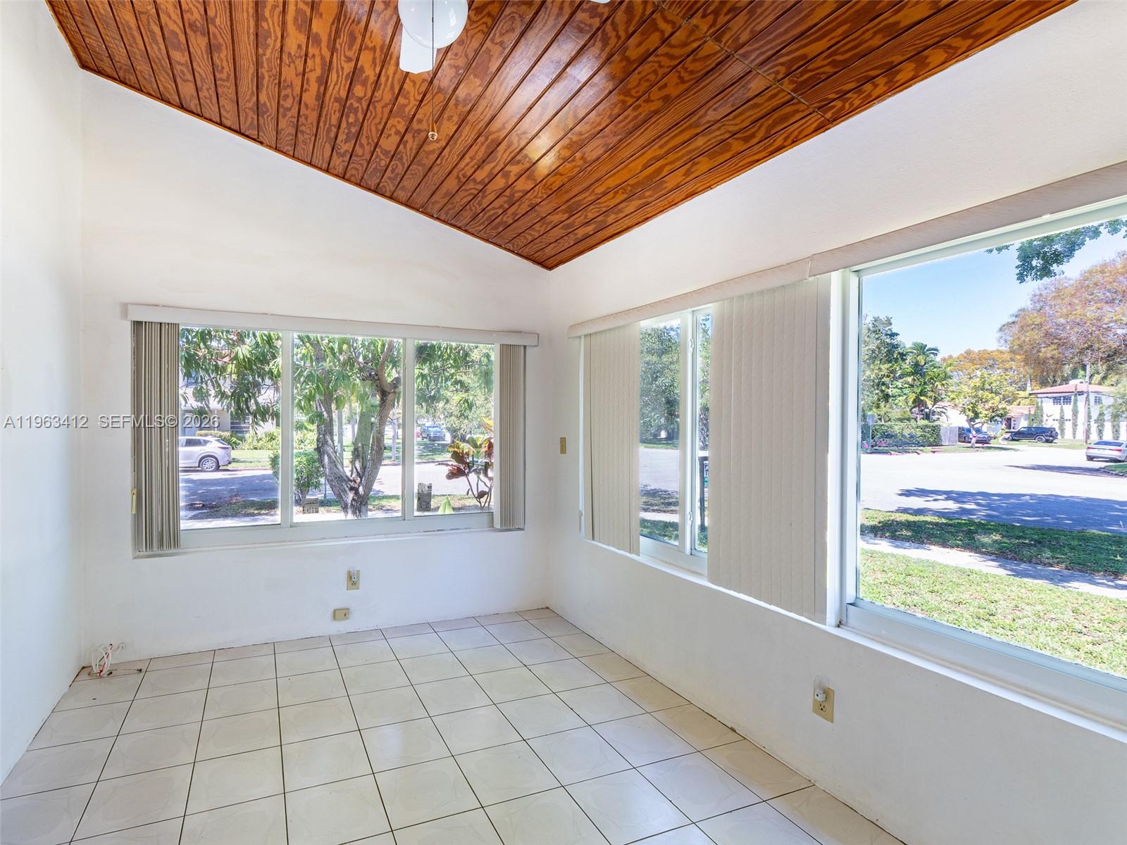 630 Southwest 25th Road Miami, FL 33129 - Photo 9 of 35 a view of an empty room with a window
