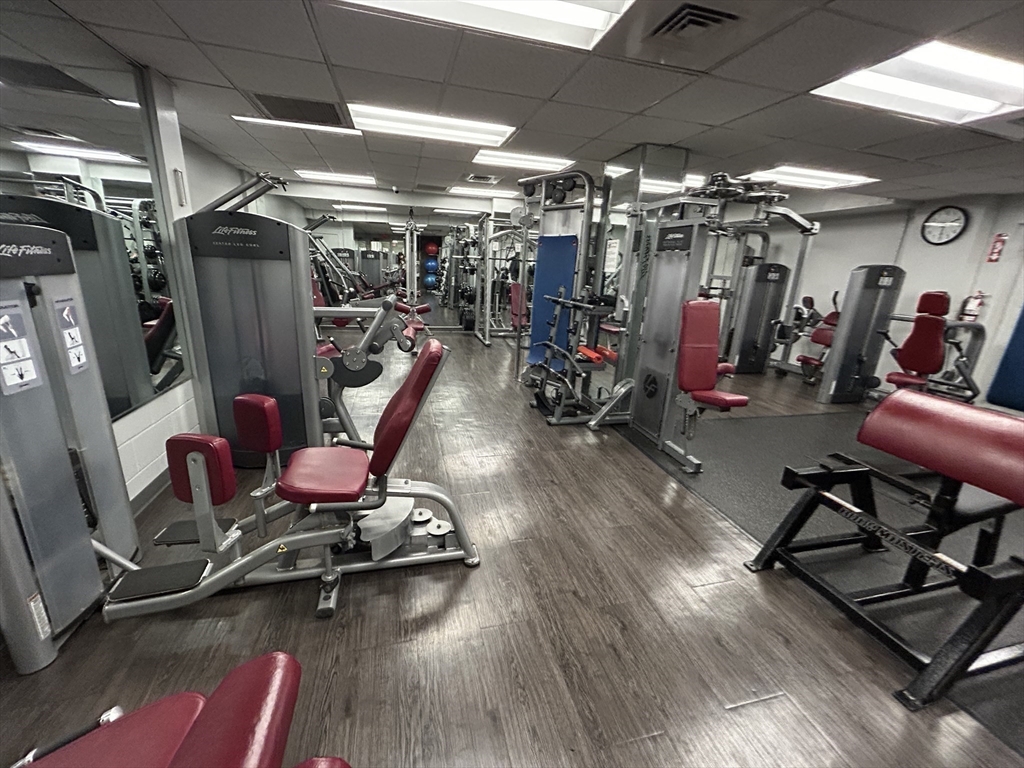 44 Washington Street, Unit 606 Brookline, MA 02445 - Photo 12 of 21 a view of a room with gym equipment
