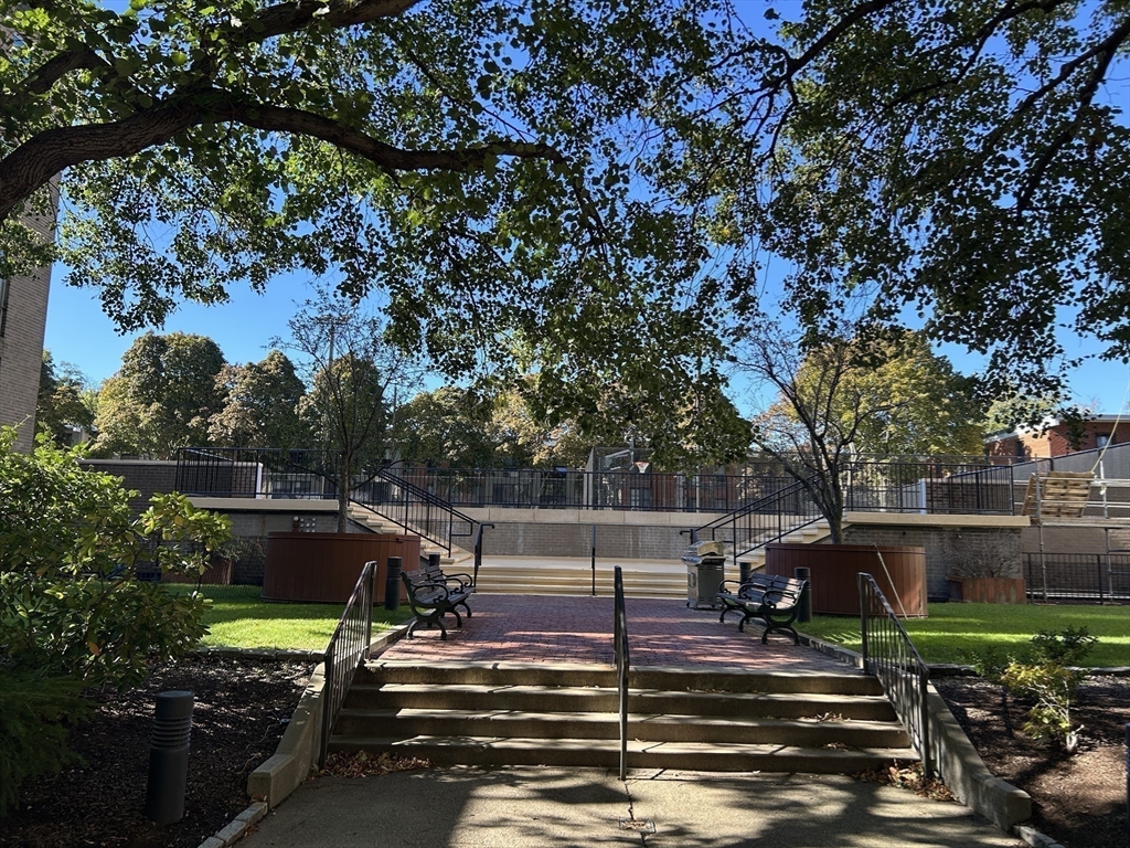 44 Washington Street, Unit 606 Brookline, MA 02445 - Photo 14 of 21 a view of yard and patio