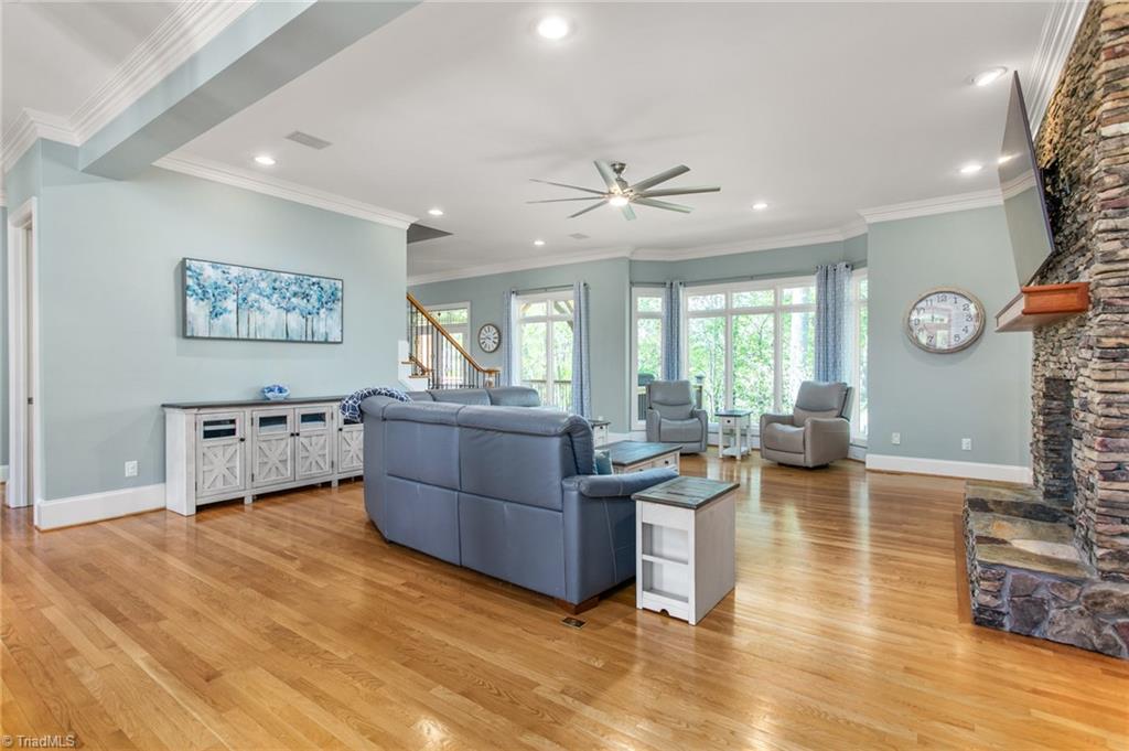 6699 Fegan Road Summerfield, NC 27358 - Photo 6 of 50 Great Room with large windows overlooking pond.