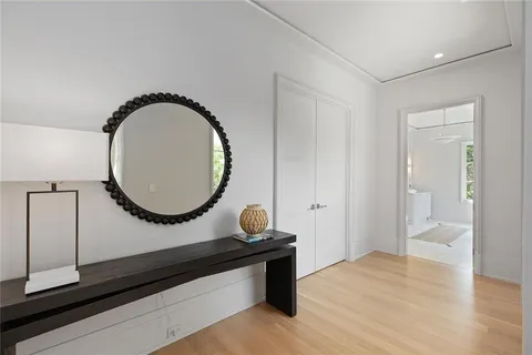 a kitchen with granite countertop a stove a sink and a window