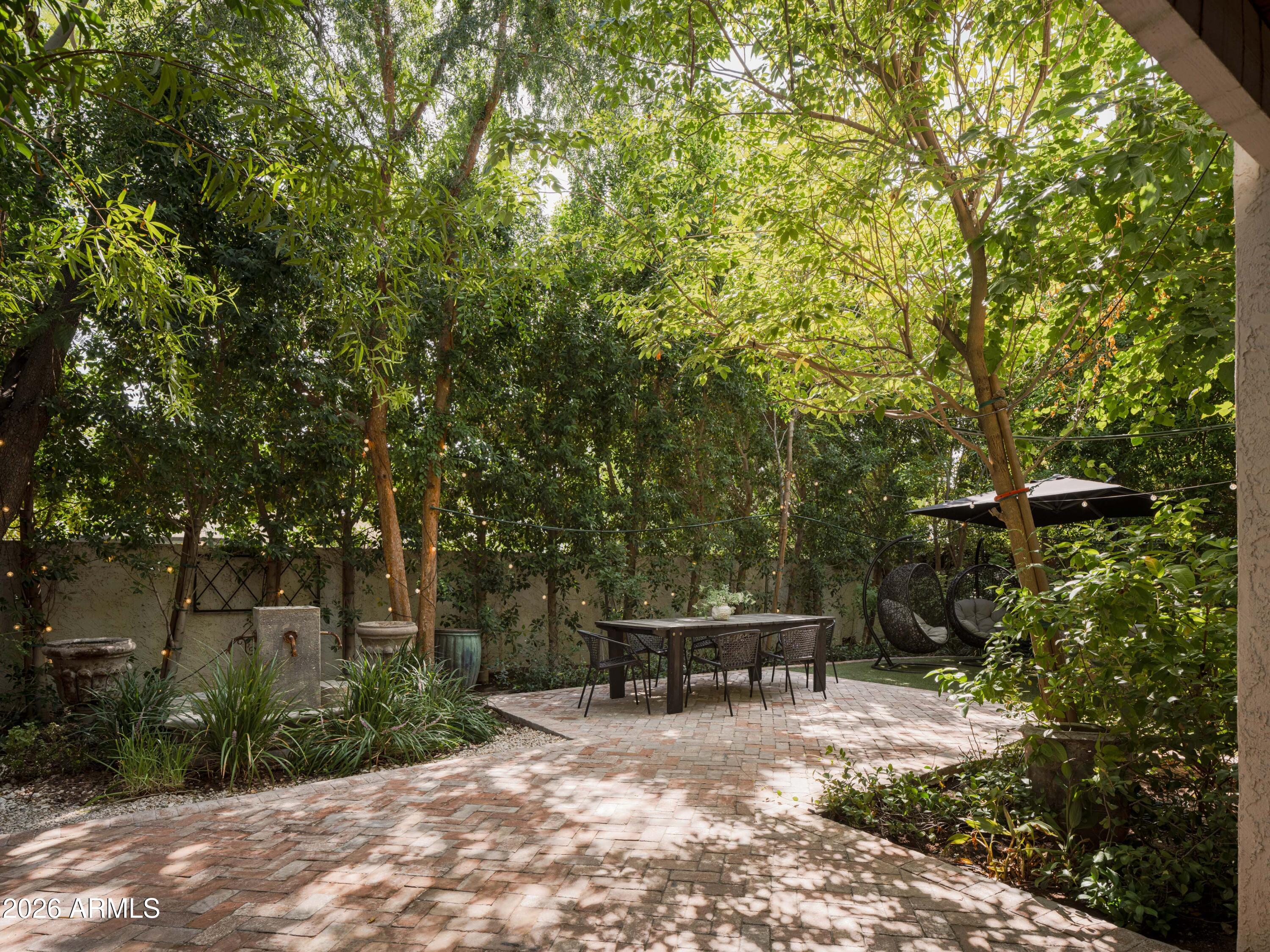 4620 North 40th Street Phoenix, AZ 85018 - Photo 22 of 26 a view of backyard with trees
