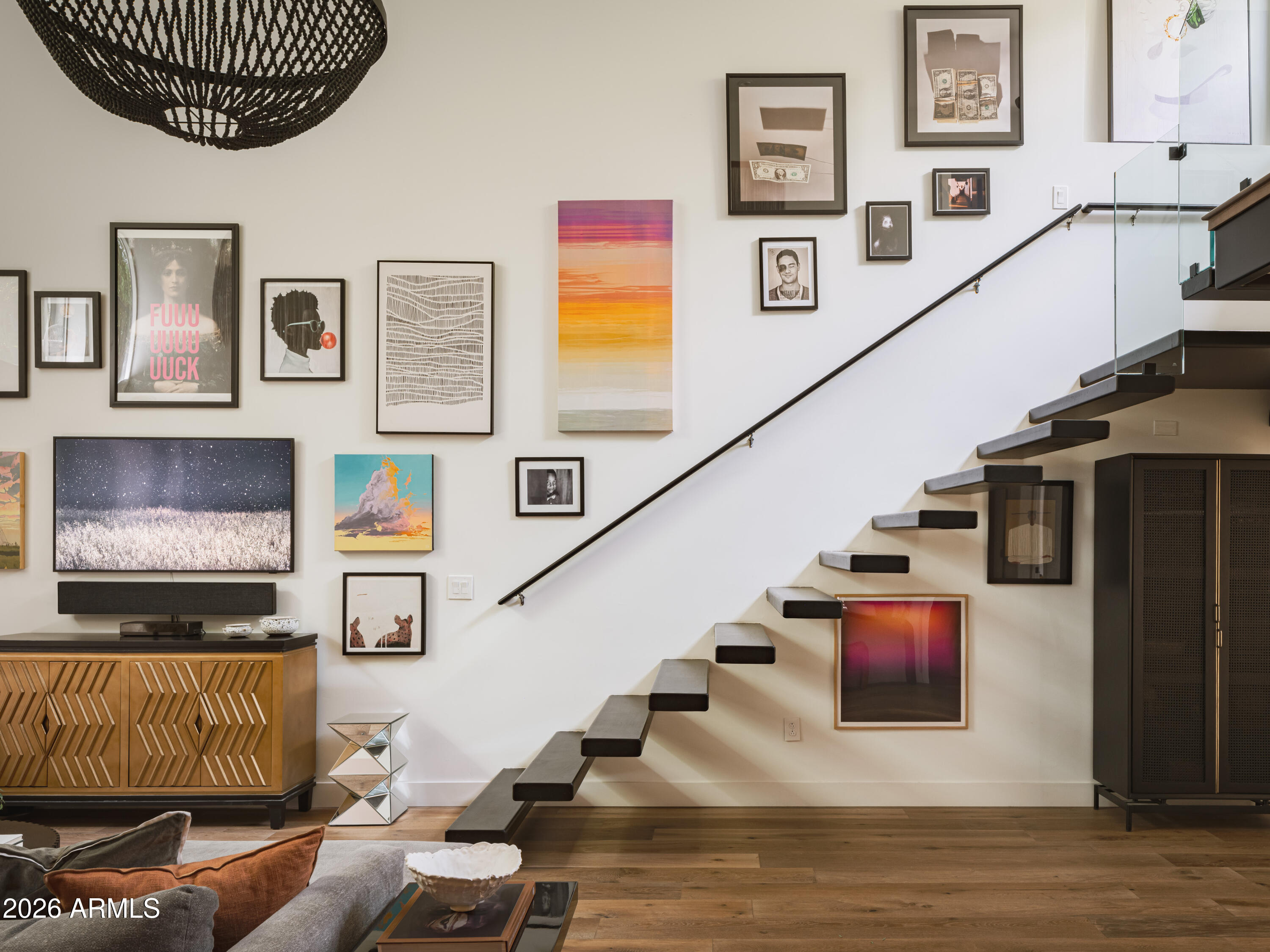 4620 North 40th Street Phoenix, AZ 85018 - Photo 5 of 26 a living room with furniture and stairs