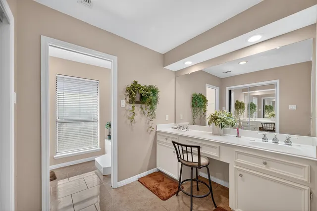 a room with a table and chairs in it