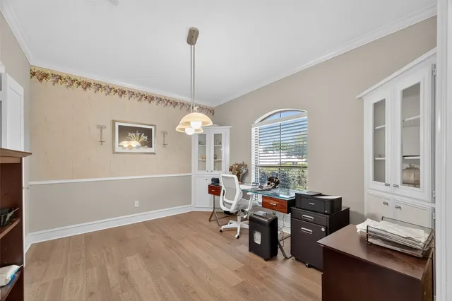 a living room with furniture and window