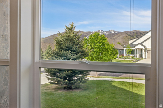1238 Canyon View Road Midway, UT 84049 - Photo 14 of 36 Double-pane window framing mountain scenery with snow-capped peaks