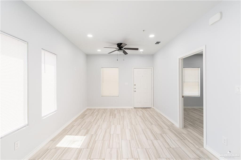 1306 Royola Street Mission, TX 78572 - Photo 12 of 16 a view of an empty room with a window