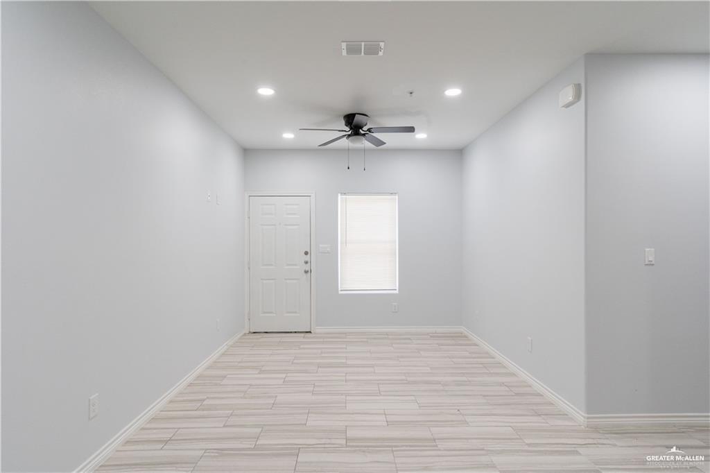 1306 Royola Street Mission, TX 78572 - Photo 7 of 16 a view of an empty room with a window