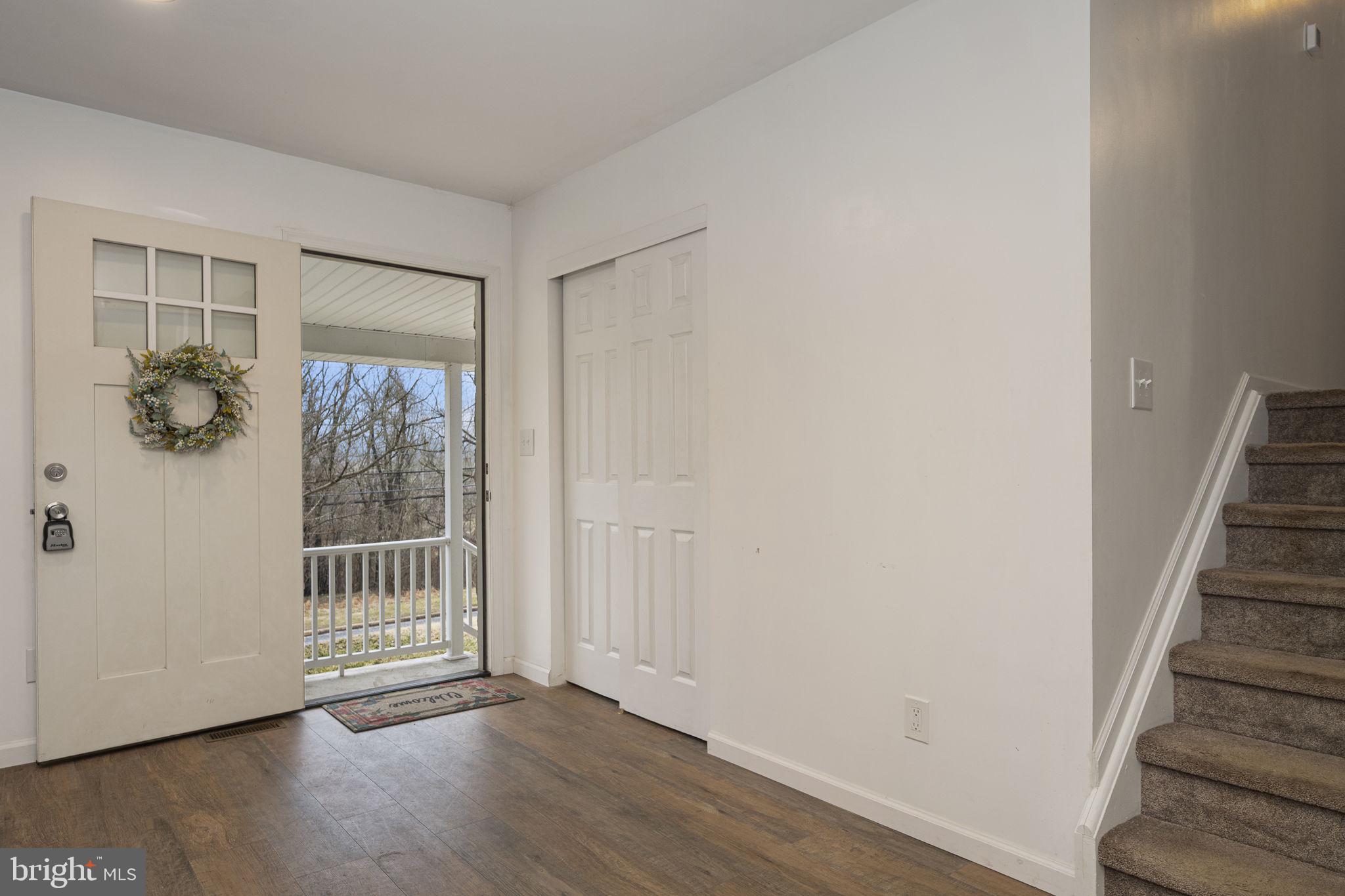 150 Modena Road Coatesville, PA 19320 - Photo 12 of 31 a view of a hallway with wooden floor and entryway