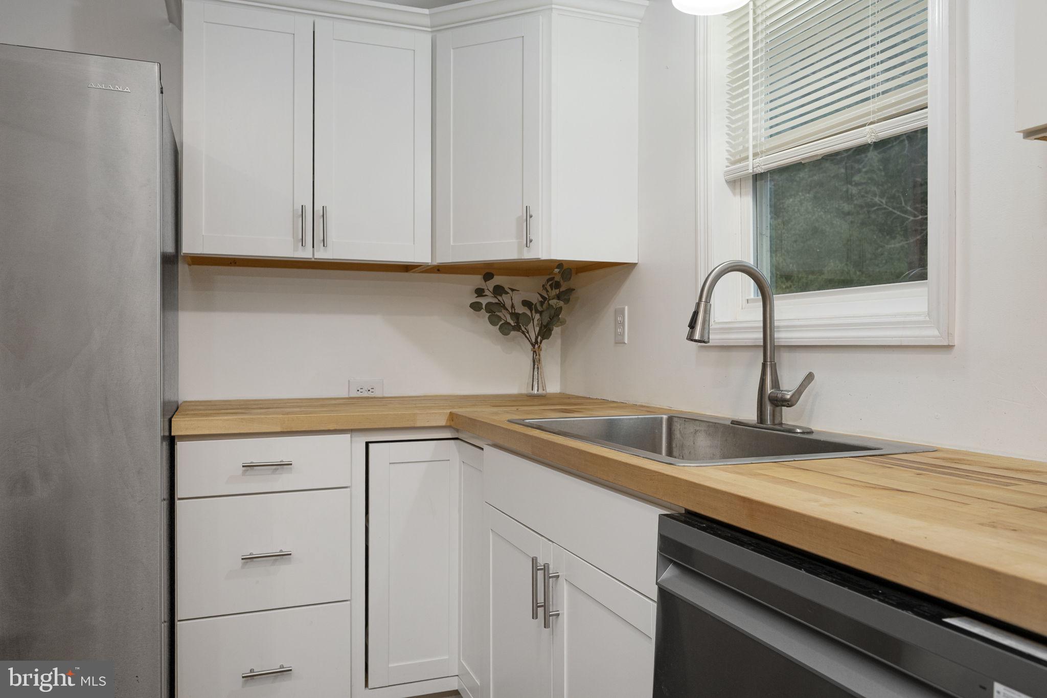 150 Modena Road Coatesville, PA 19320 - Photo 15 of 31 a kitchen with a sink and cabinets