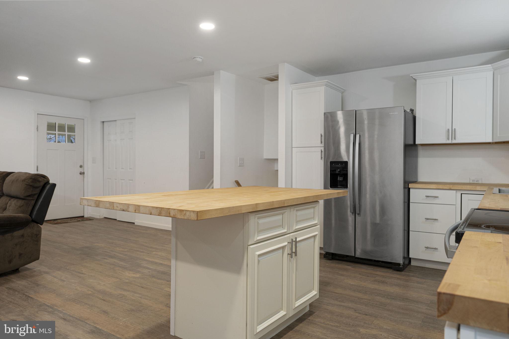 150 Modena Road Coatesville, PA 19320 - Photo 17 of 31 a kitchen with stainless steel appliances granite countertop a refrigerator and a stove top oven
