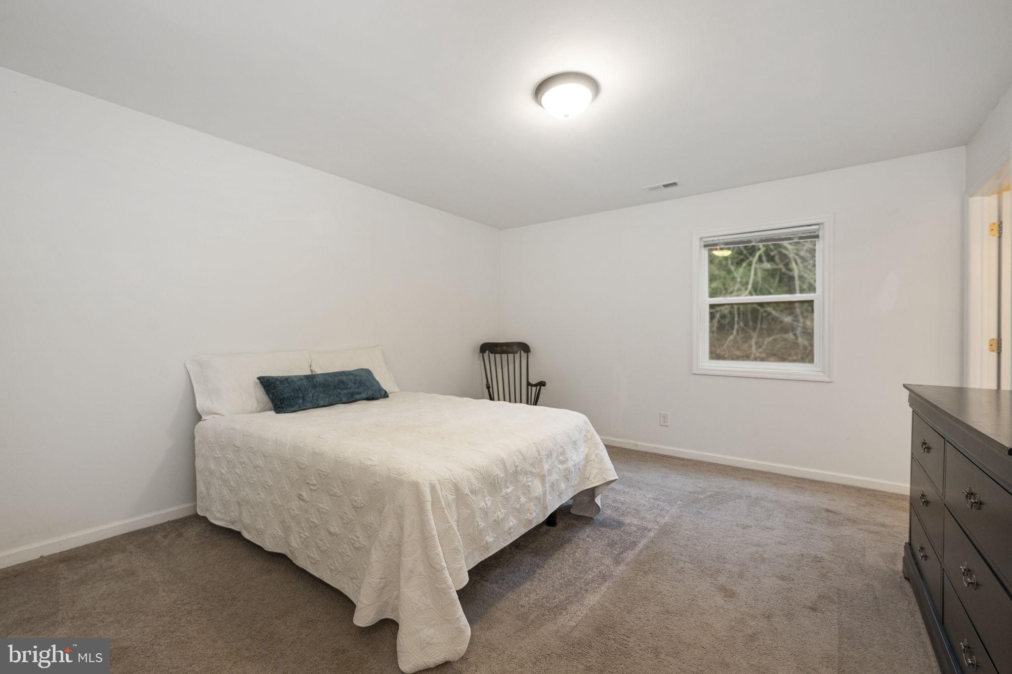 150 Modena Road Coatesville, PA 19320 - Photo 19 of 31 a bedroom with a bed and a window