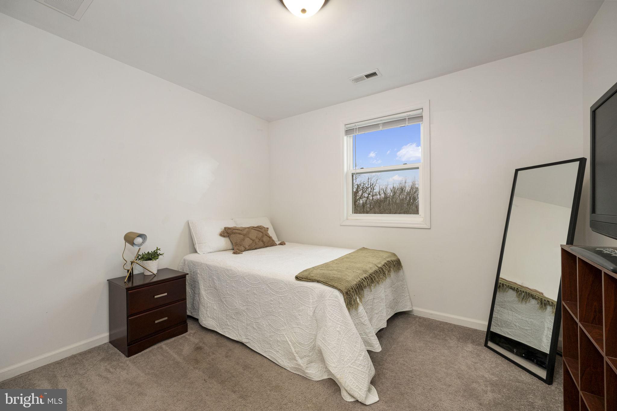 150 Modena Road Coatesville, PA 19320 - Photo 24 of 31 a bedroom with a bed and a window