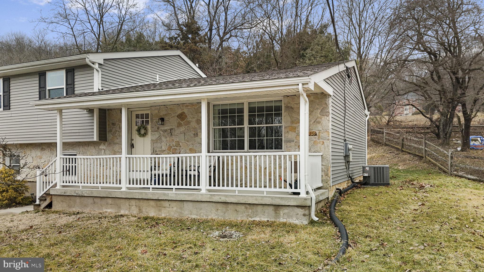 150 Modena Road Coatesville, PA 19320 - Photo 3 of 31 a front view of a house with a large window