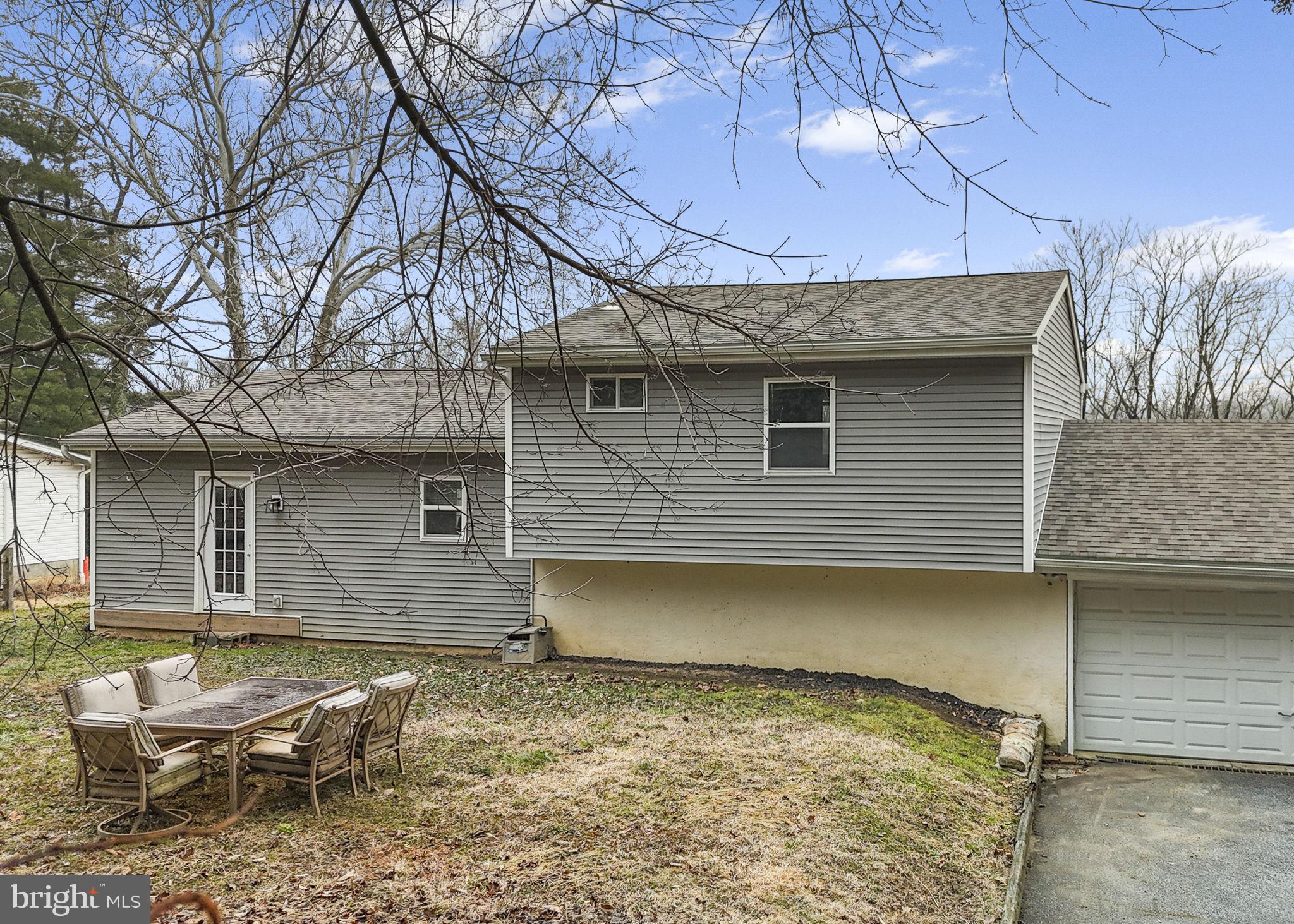 150 Modena Road Coatesville, PA 19320 - Photo 6 of 31 a front view of a house with a yard