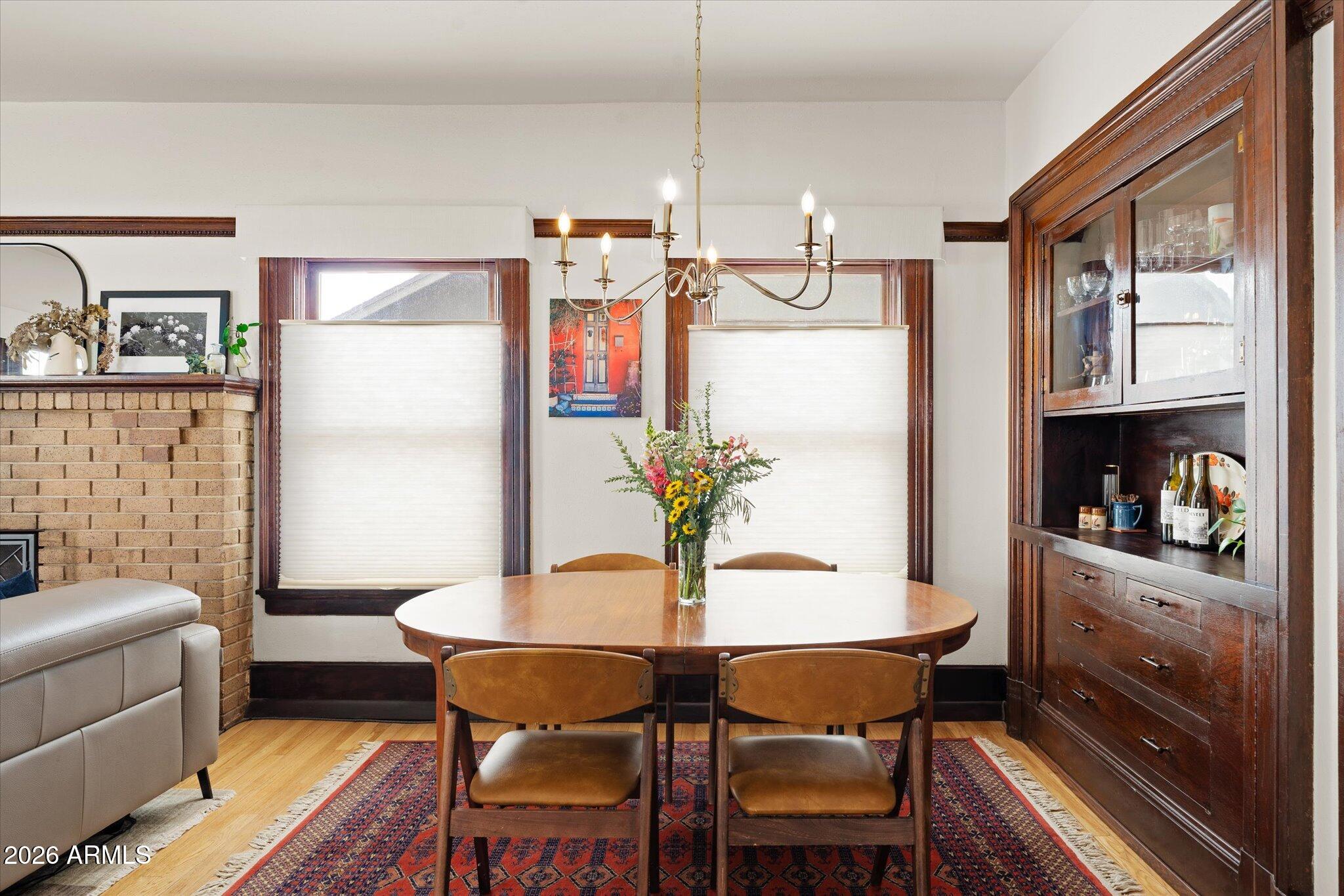 1348 East Fillmore Street Phoenix, AZ 85006 - Photo 11 of 41 a dining room with furniture and window