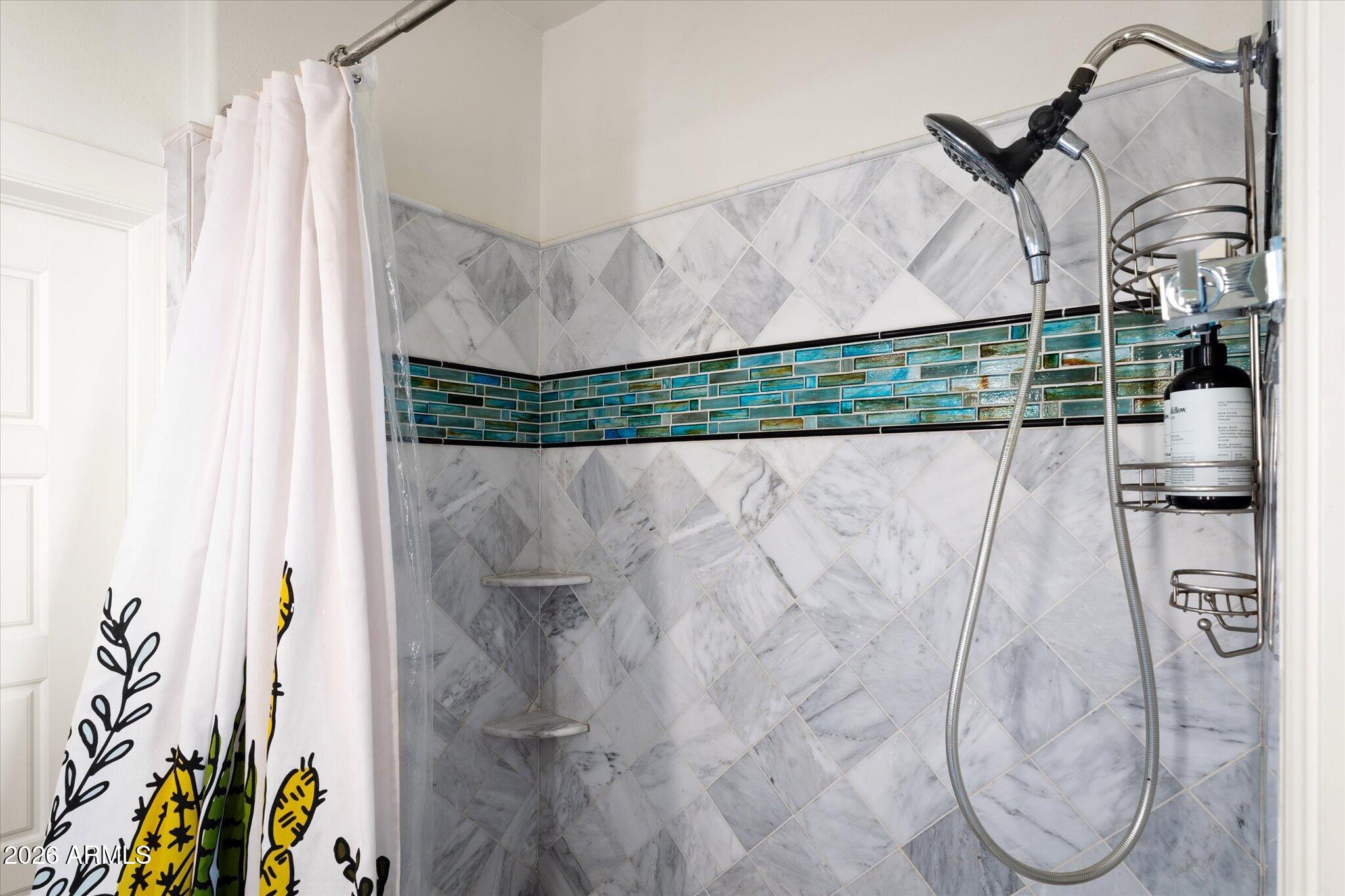 1348 East Fillmore Street Phoenix, AZ 85006 - Photo 31 of 41 a picture of a bathroom with a shower