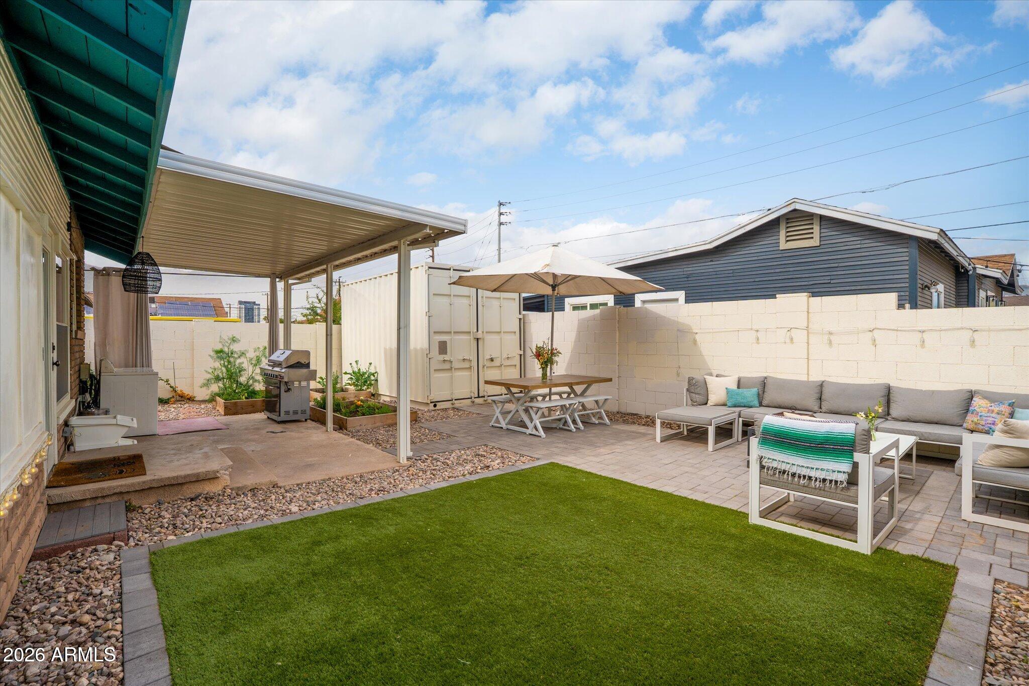 1348 East Fillmore Street Phoenix, AZ 85006 - Photo 36 of 41 a view of a backyard with sitting area