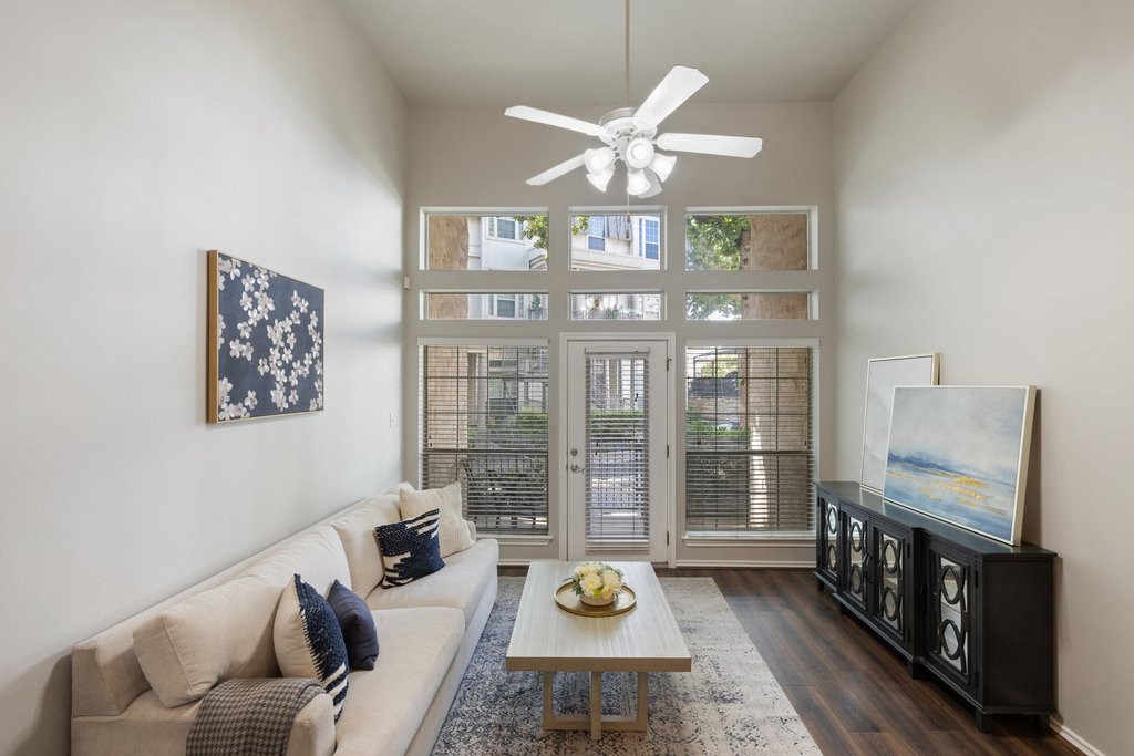 2918 Ranch Road 620 North, Unit 268 Austin, TX 78734 - Photo 6 of 40 High ceilings and a wall of windows define this welcoming living space.