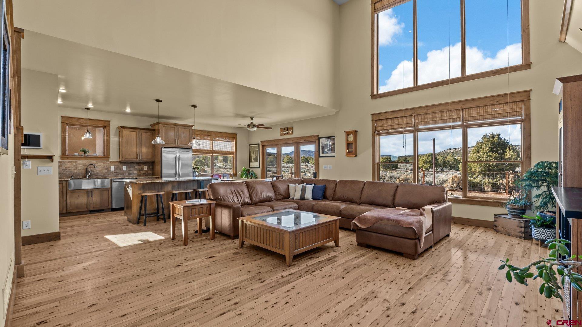 2601 South 21 1/2 Road Glade Park, CO 81523 - Photo 22 of 45 a living room with furniture kitchen view and a large window