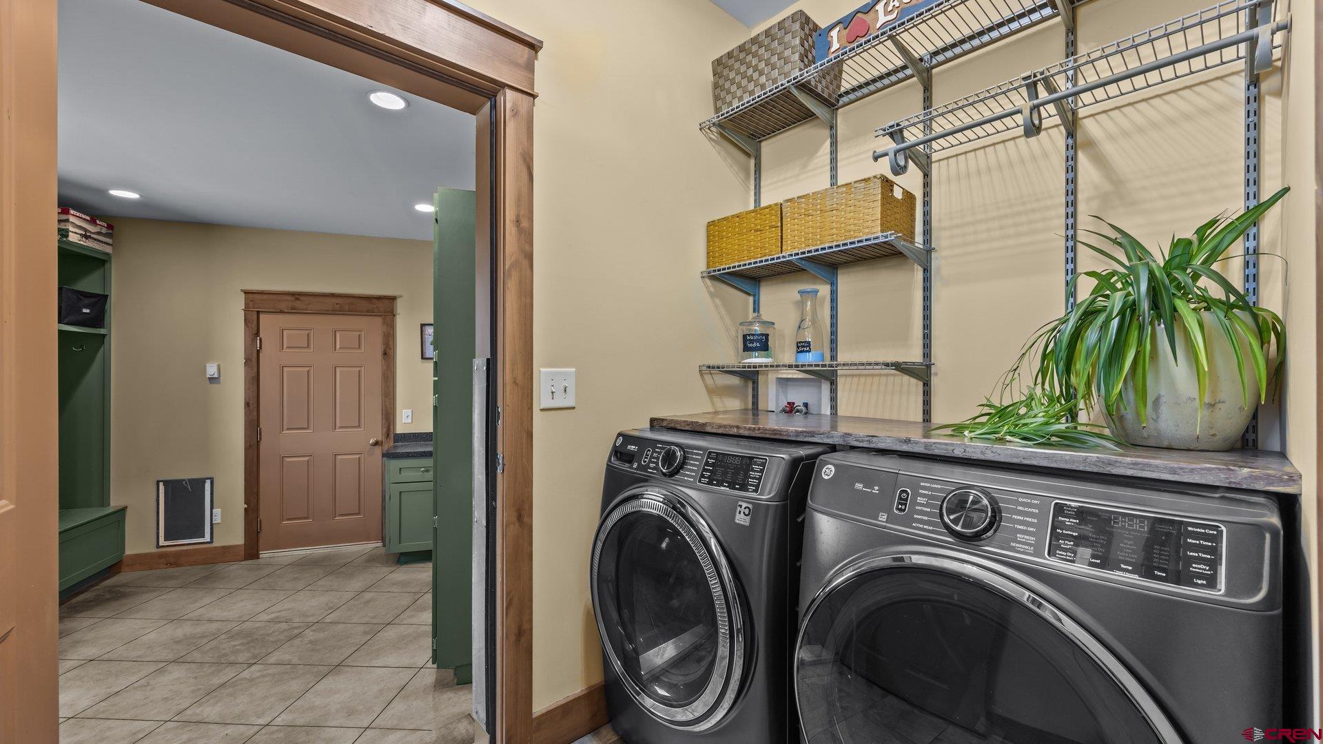 2601 South 21 1/2 Road Glade Park, CO 81523 - Photo 26 of 45 a view of a storage & utility room with a washer and dryer