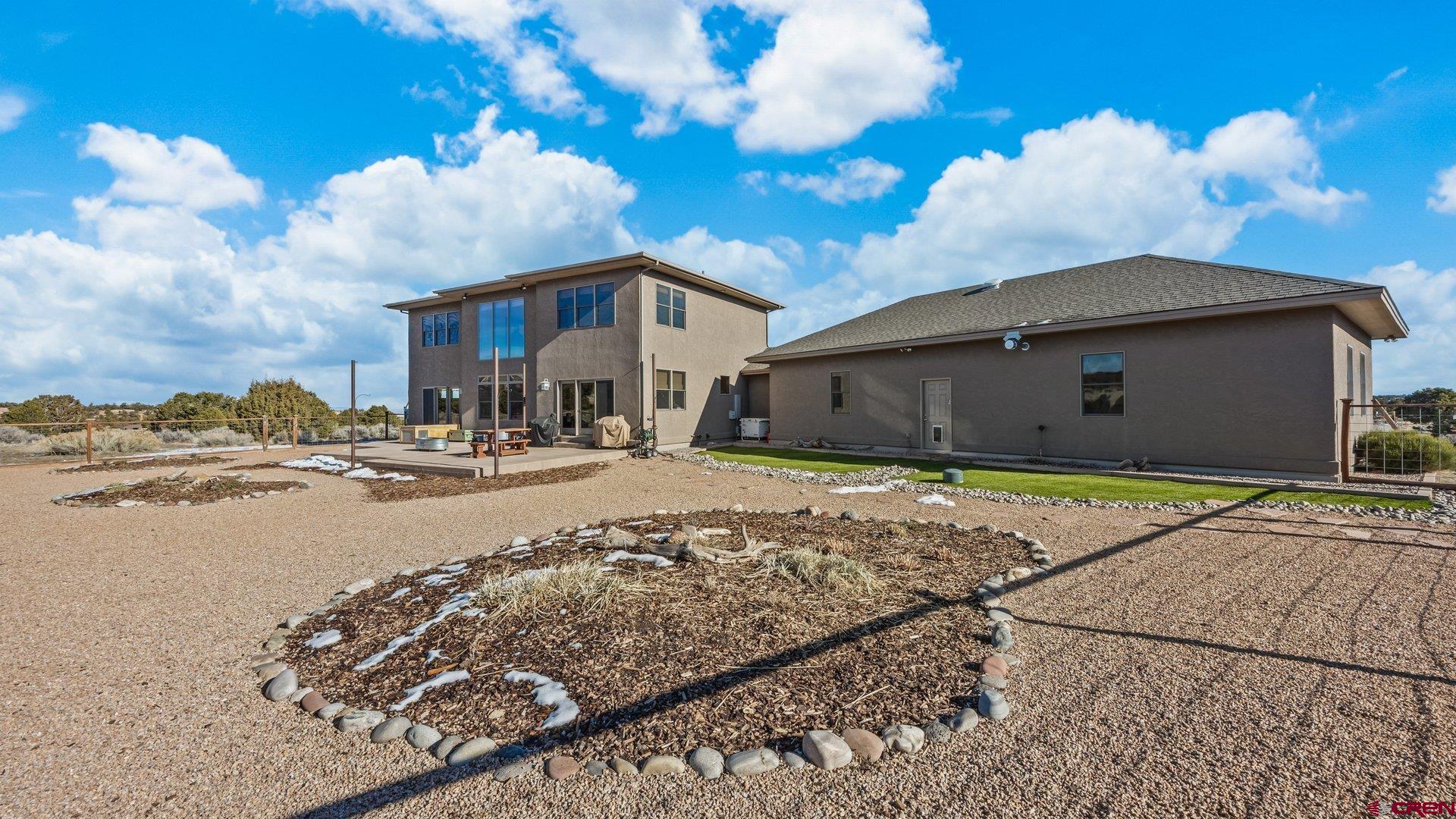 2601 South 21 1/2 Road Glade Park, CO 81523 - Photo 5 of 45 a front view of a house with a yard
