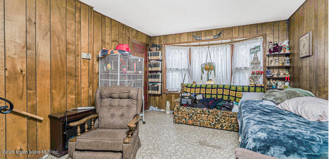 35 Shawnee Street Staten Island, NY 10310 - Photo 17 of 23 a living room with furniture and a window