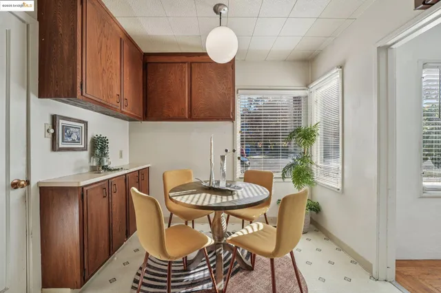 a kitchen with a sink stove and refrigerator