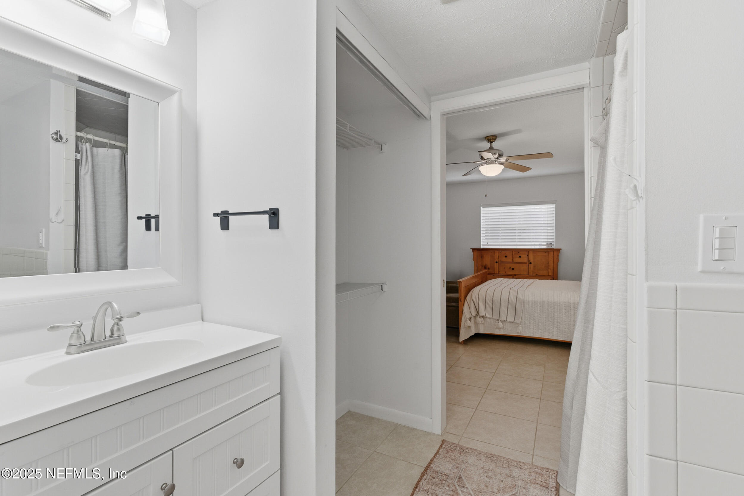 276 Baisden Road Jacksonville, FL 32218 - Photo 19 of 71 a en suite bathroom with a sink and a mirror