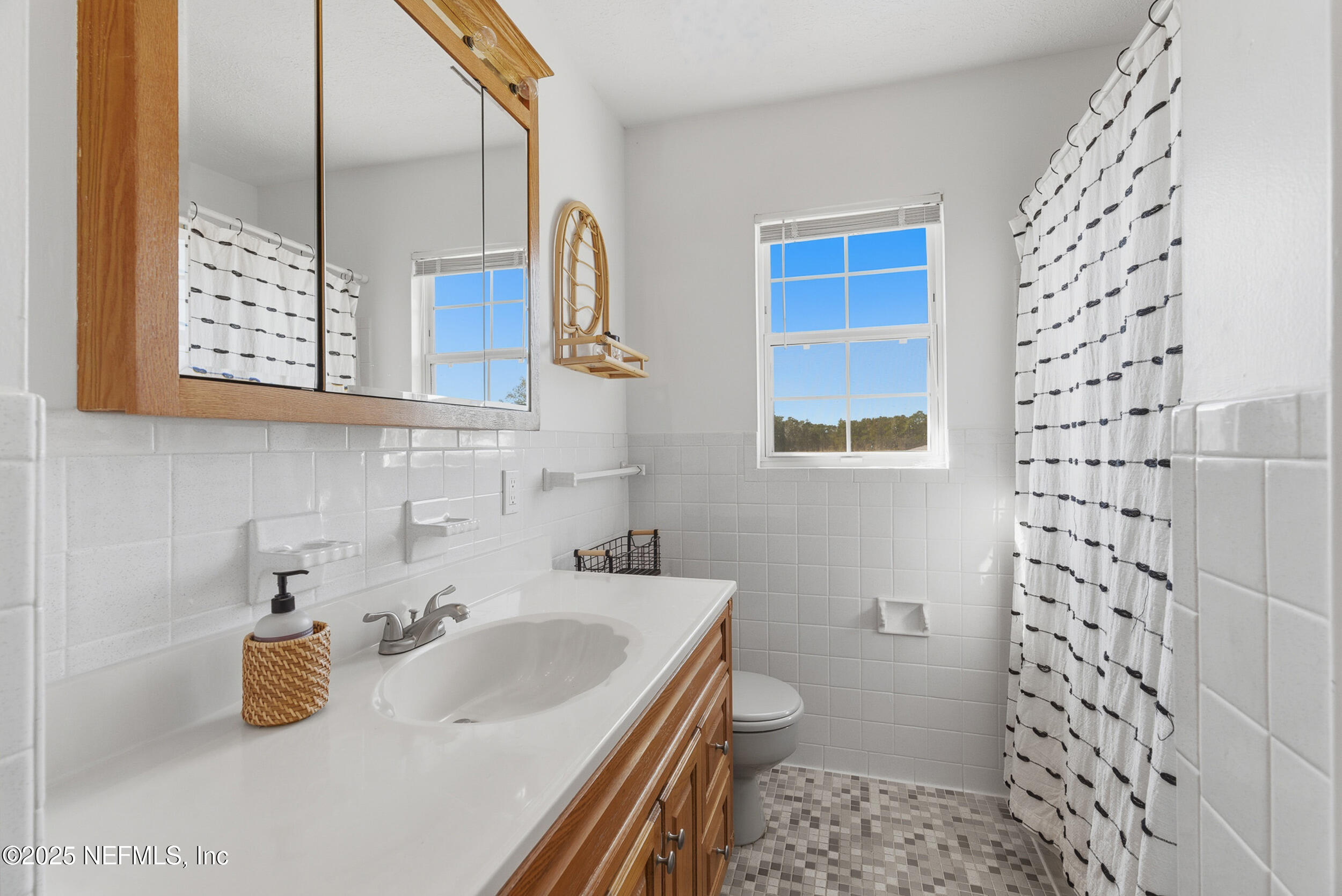 276 Baisden Road Jacksonville, FL 32218 - Photo 24 of 71 a bathroom with a sink a toilet and shower