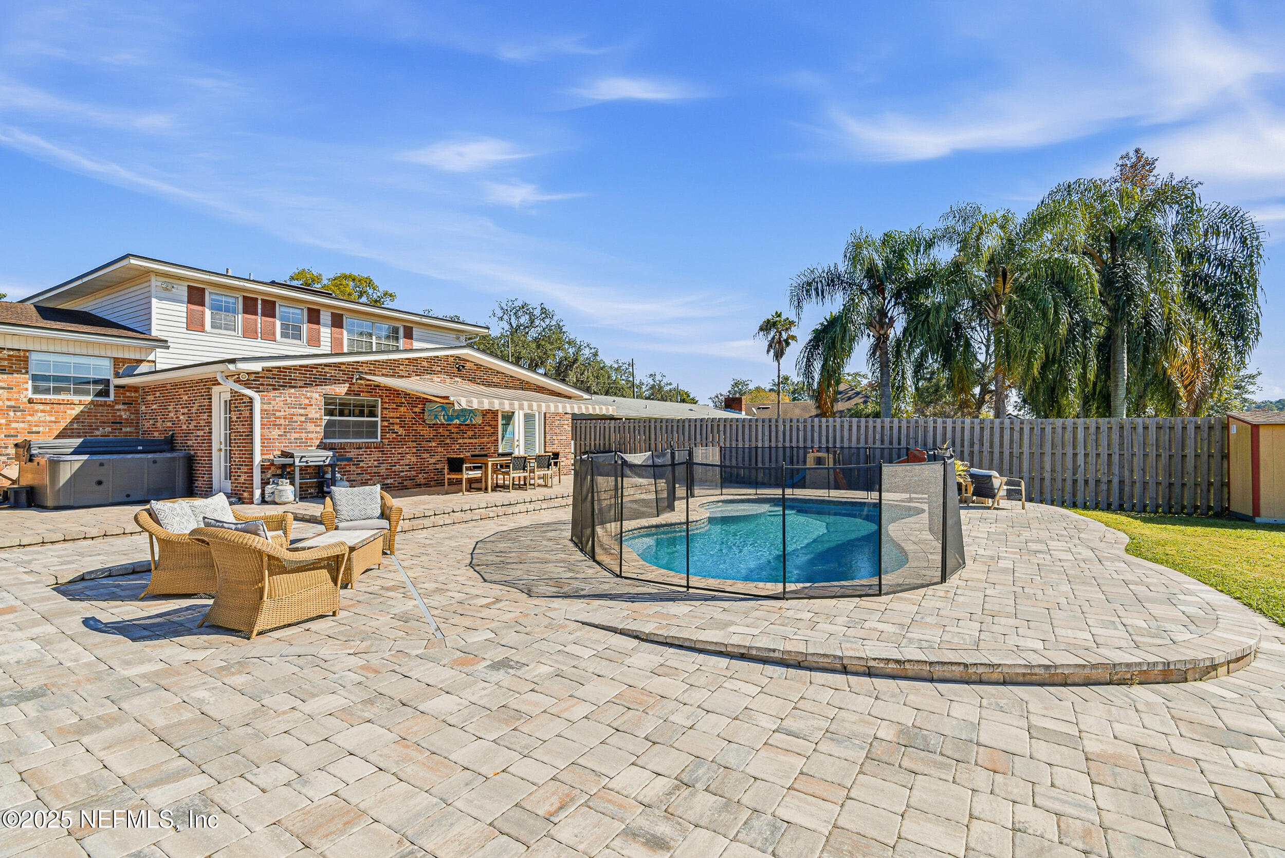 276 Baisden Road Jacksonville, FL 32218 - Photo 35 of 71 a view of a swimming pool with a patio