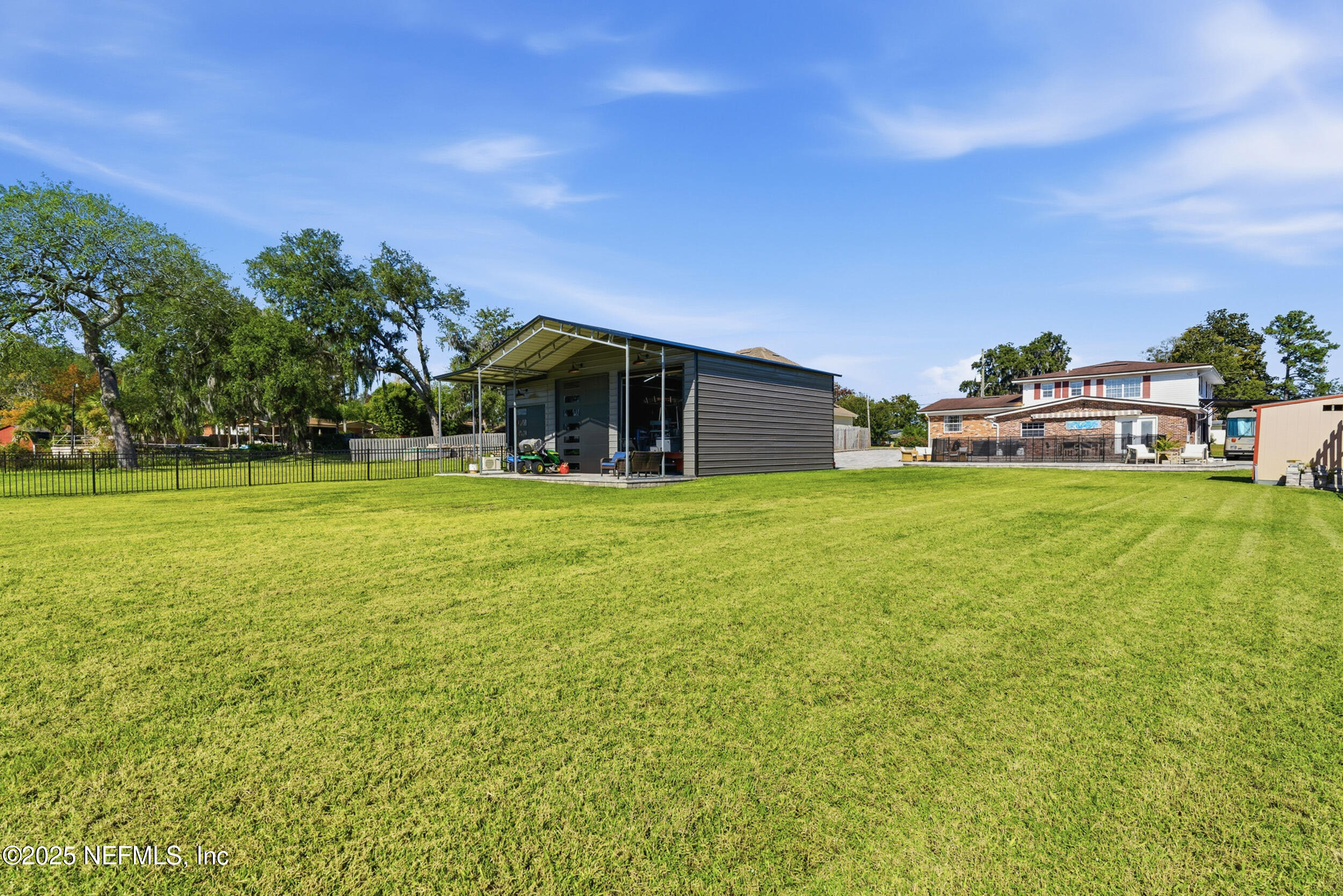 276 Baisden Road Jacksonville, FL 32218 - Photo 47 of 71 a view of a house with a yard and sitting area