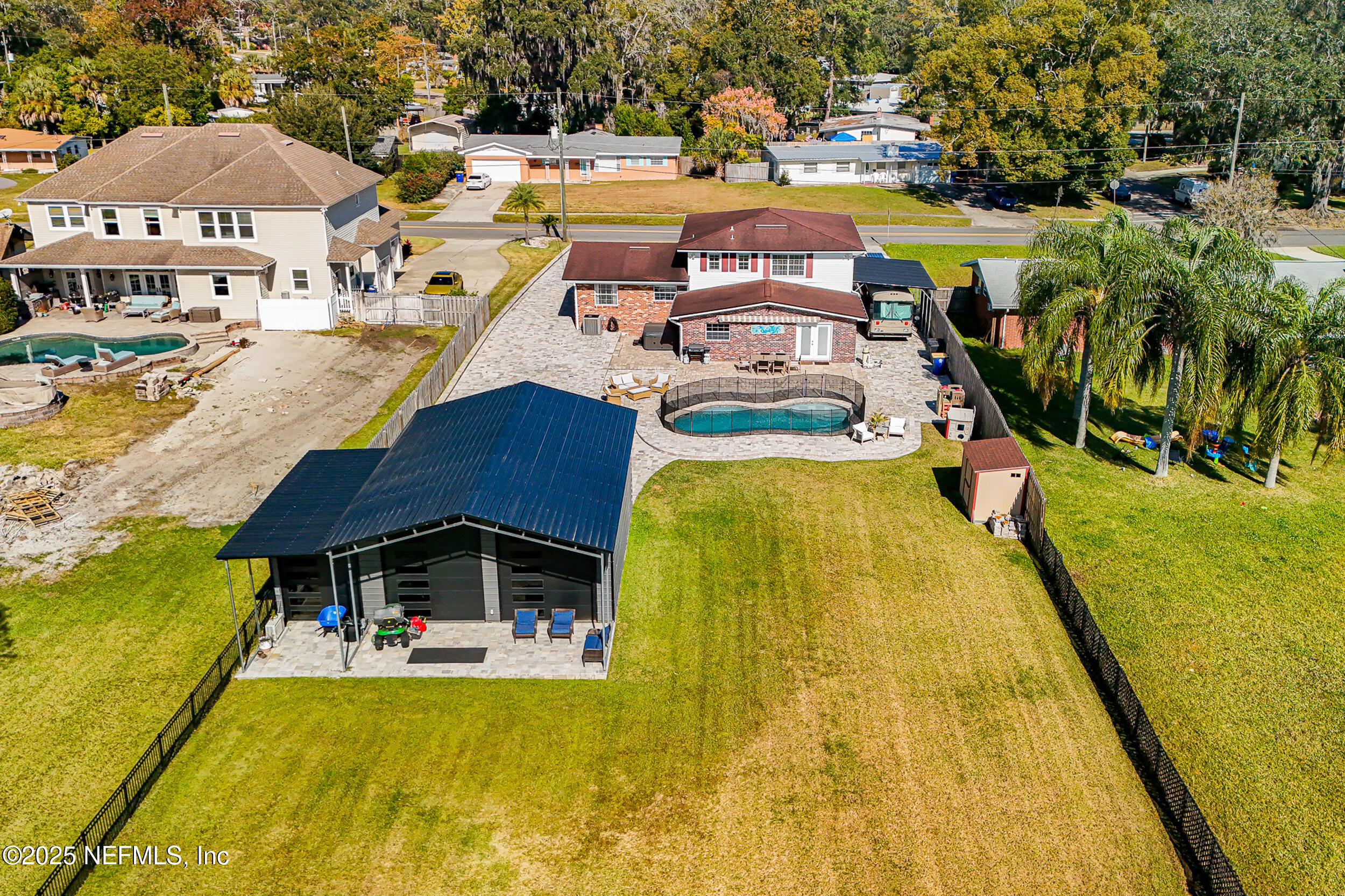 276 Baisden Road Jacksonville, FL 32218 - Photo 52 of 71 a view of swimming pool with outdoor seating and yard