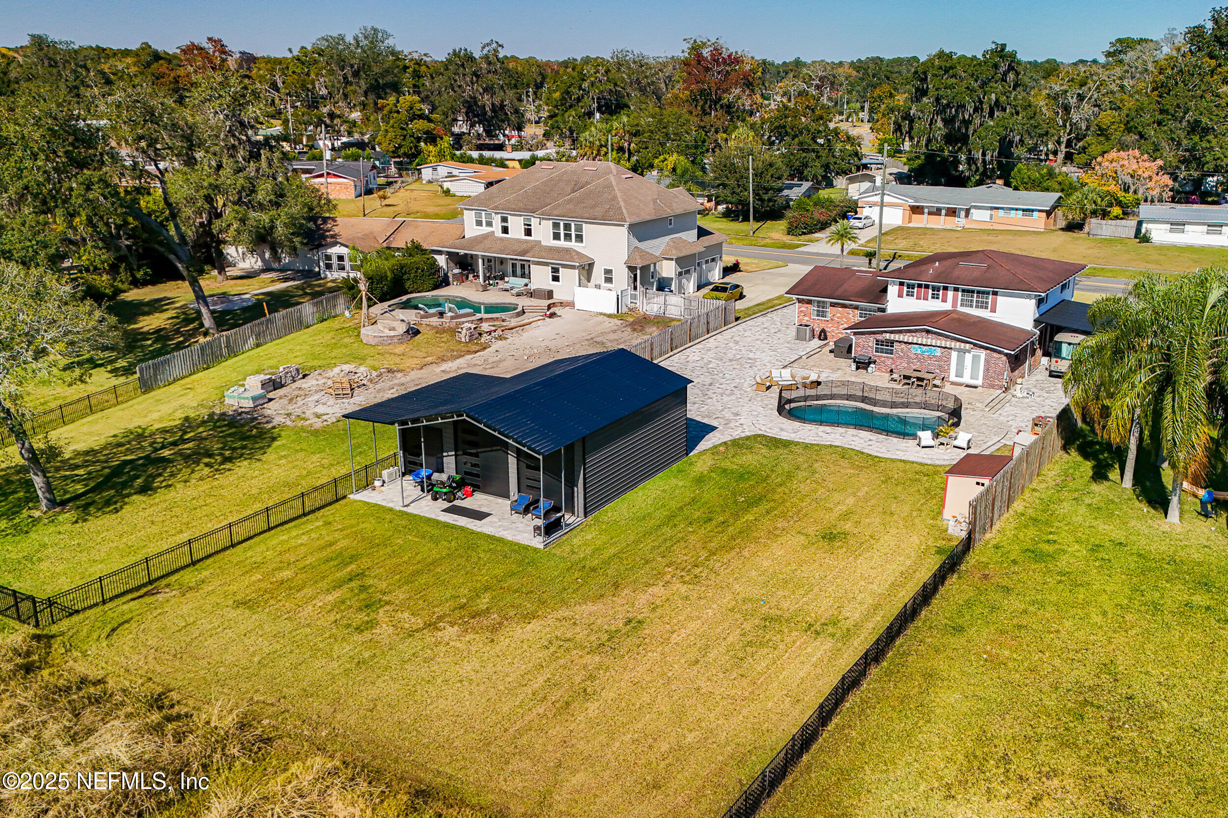 276 Baisden Road Jacksonville, FL 32218 - Photo 53 of 71 a view of a swimming pool with lounge chairs