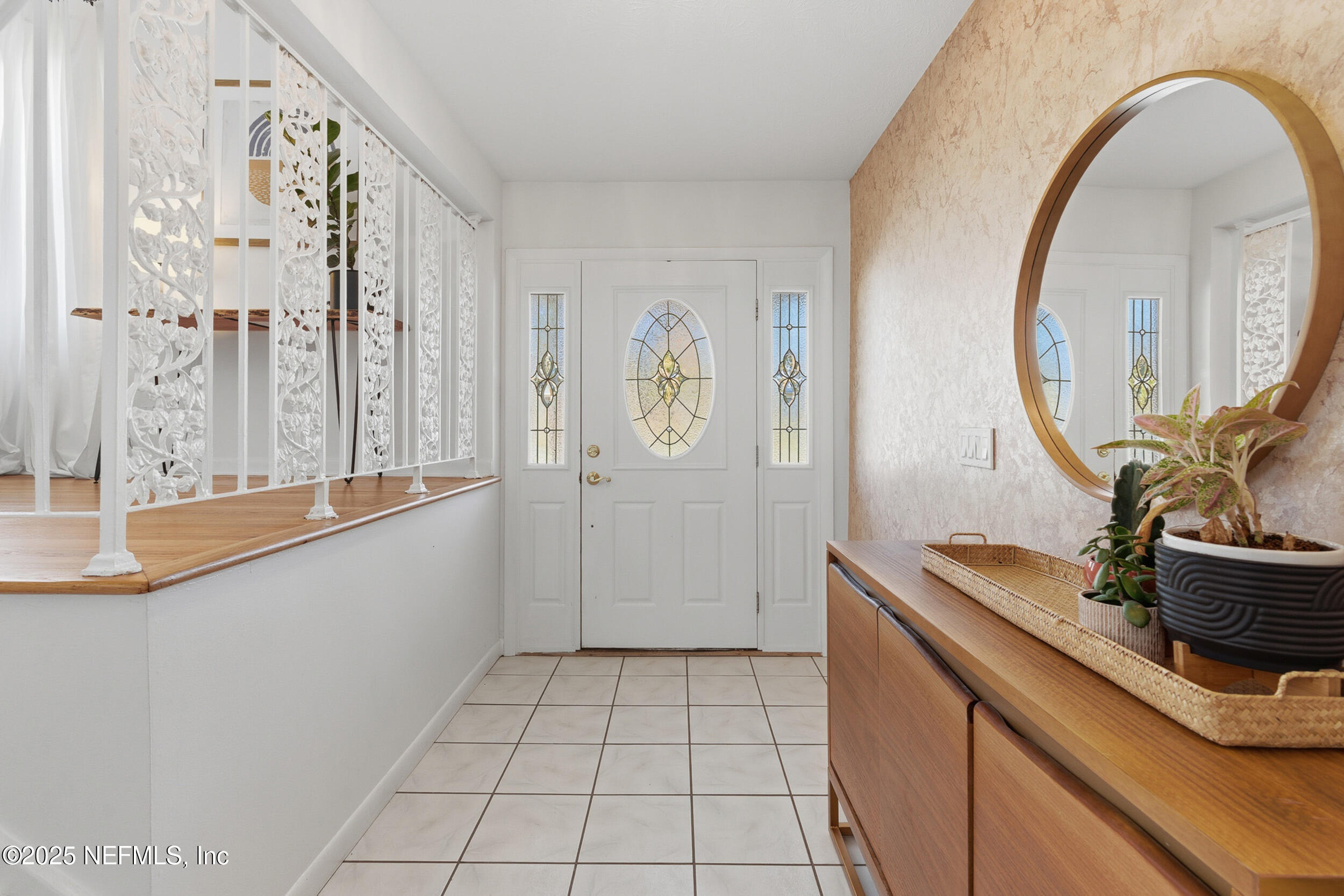 276 Baisden Road Jacksonville, FL 32218 - Photo 6 of 71 a bathroom with a granite countertop sink a mirror and a shower