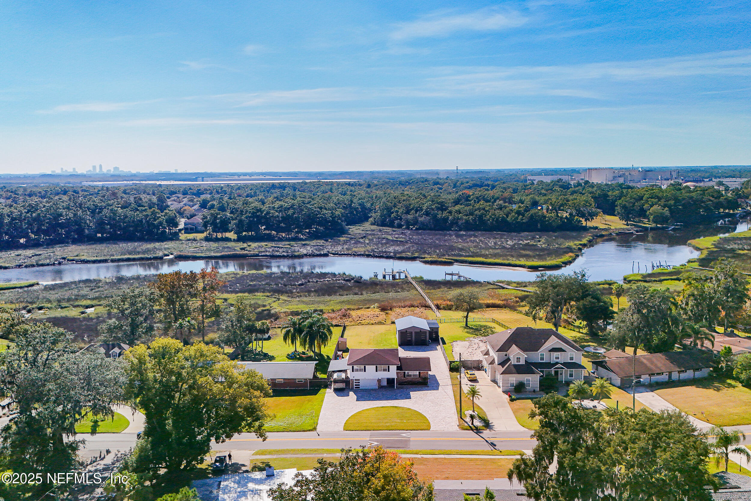 276 Baisden Road Jacksonville, FL 32218 - Photo 66 of 71 a view of swimming pool with outdoor seating and city view