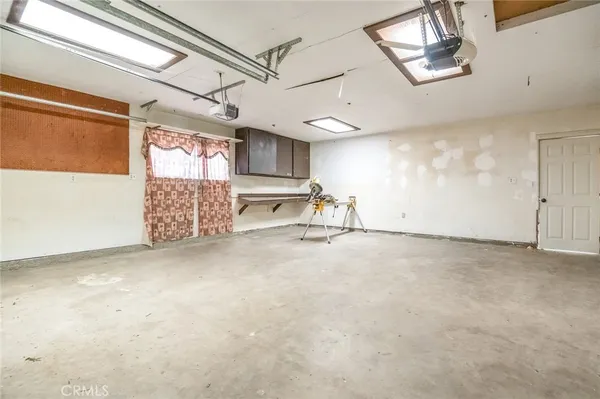 a view of a room with wooden walls