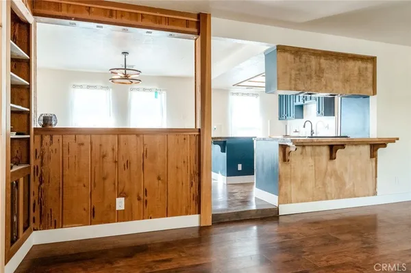 a view of kitchen with furniture and window
