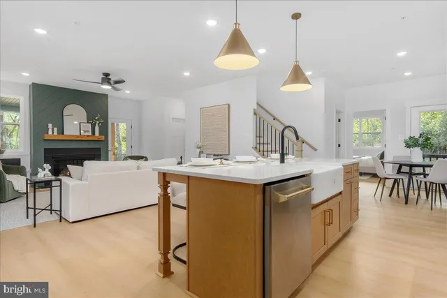 a kitchen with sink and center island