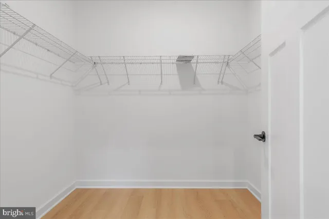 a view of an empty walk in closet